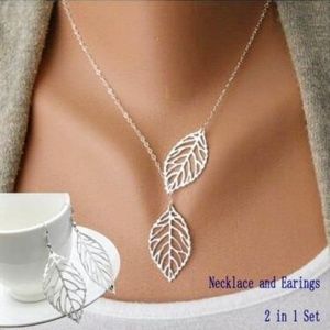 Women's silver necklace earring set
